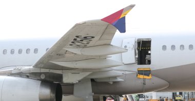 Asiana Airlines' Airbus A321 plane, of which a passenger opened a door on a flight shortly before the aircraft landed, is pictured at an airport, Daegu, South Korea, May 26, 2023. (Reuters Photo)