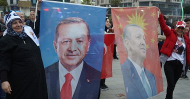 Supporters of President Recep Tayyip Erdoğan hold up flags of the president as they celebrate early victory in exit poll results for the presidential runoff in Rize, Türkiye, May 28, 2023. (IHA Photo)