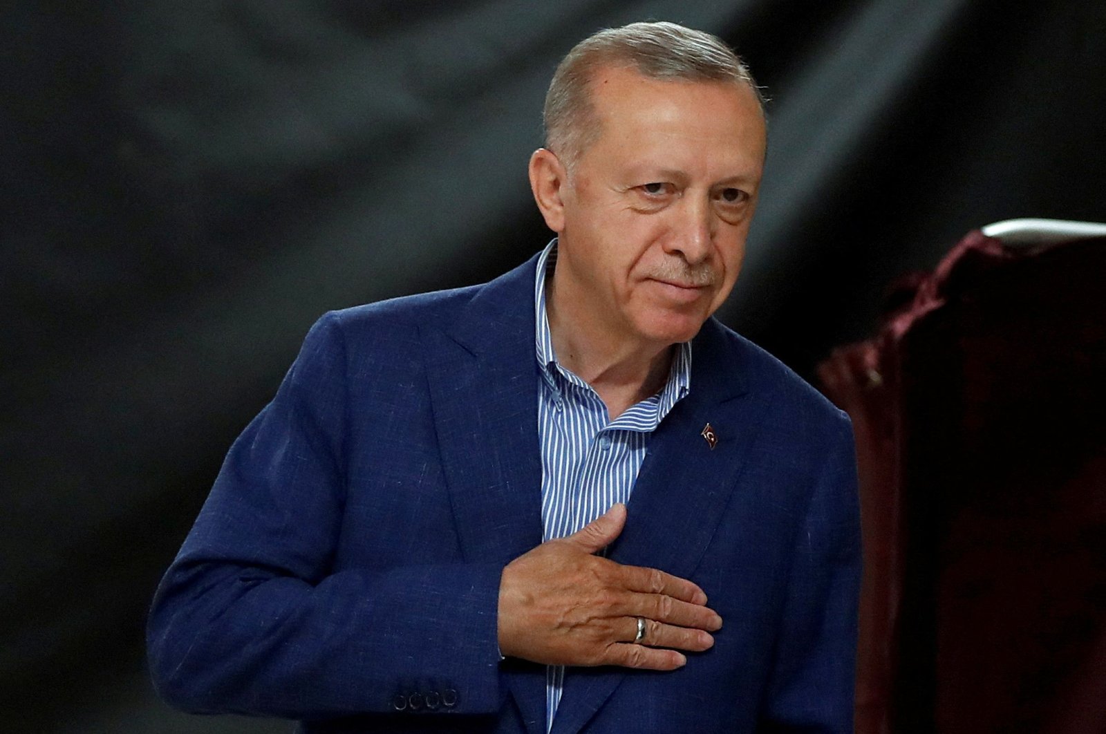 President and presidential candidate Recep Tayyip Erdoğan gestures at the polling station on the day of the presidential runoff vote in Istanbul, Türkiye, May 28, 2023. (AFP Photo)