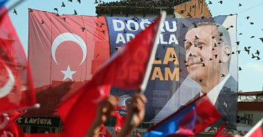 An election banner is seen as supporters of President Recep Tayyip Erdoğan gather for his election campaign rally prior to the second round of presidential elections in Istanbul, Türkiye, May 26, 2023. (EPA Photo)
