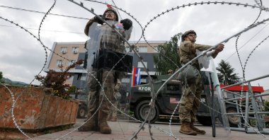U.S. KFOR soldiers stand guard in front of the municipality office, Leposavic, Kosovo, May 29, 2023. (Reuters Photo)