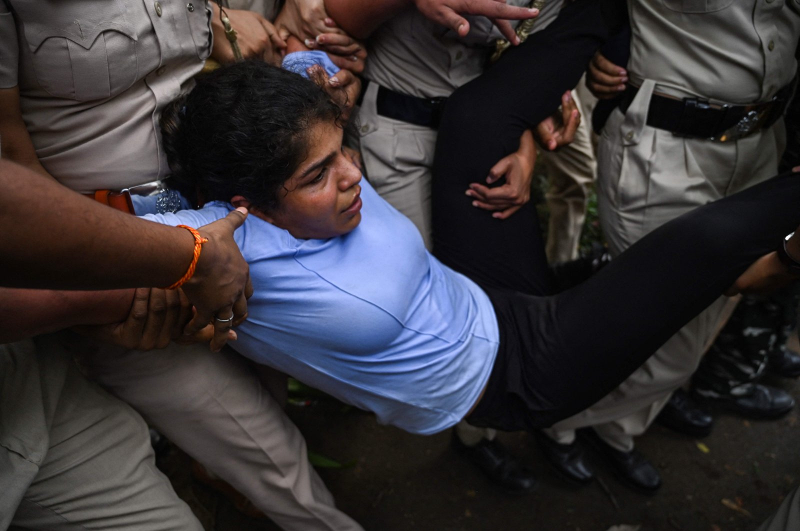 Indian wrestler Sakshi Malik is detained by the police while attempting to march to India&#039;s new parliament, just as it was being inaugurated by Prime Minister Narendra Modi, during a protest against Brij Bhushan Singh, the wrestling federation chief, over allegations of sexual harassment and intimidation, New Delhi, India, May 28, 2023. (AFP Photo)
