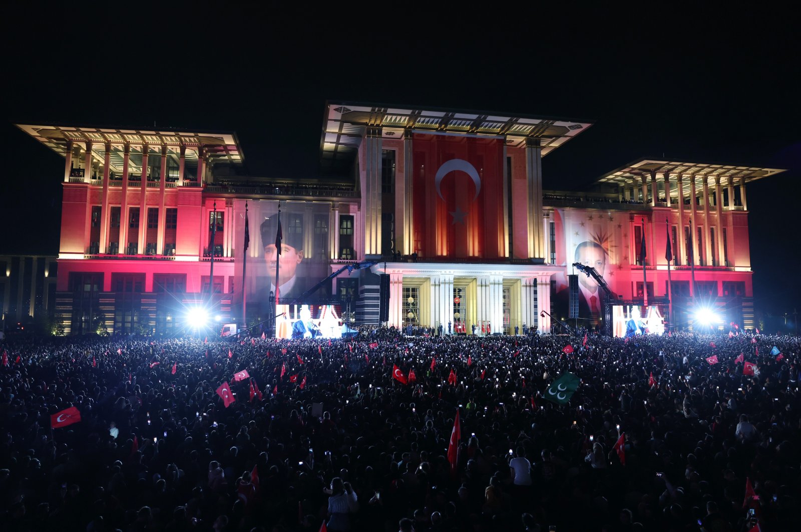 The crowd gathers outside the Presidential Complex adorned with posters of republic founder Mustafa Kemal Atatürk and President Recep Tayyip Erdoğan, in the capital Ankara, Türkiye, May 29, 2023. (AA Photo)