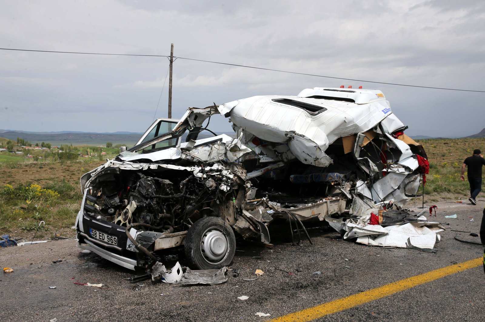 The wreckage of a collision of a truck and a passenger minibus in Sivas, Türkiye, May 29, 2023. (AA Photo)