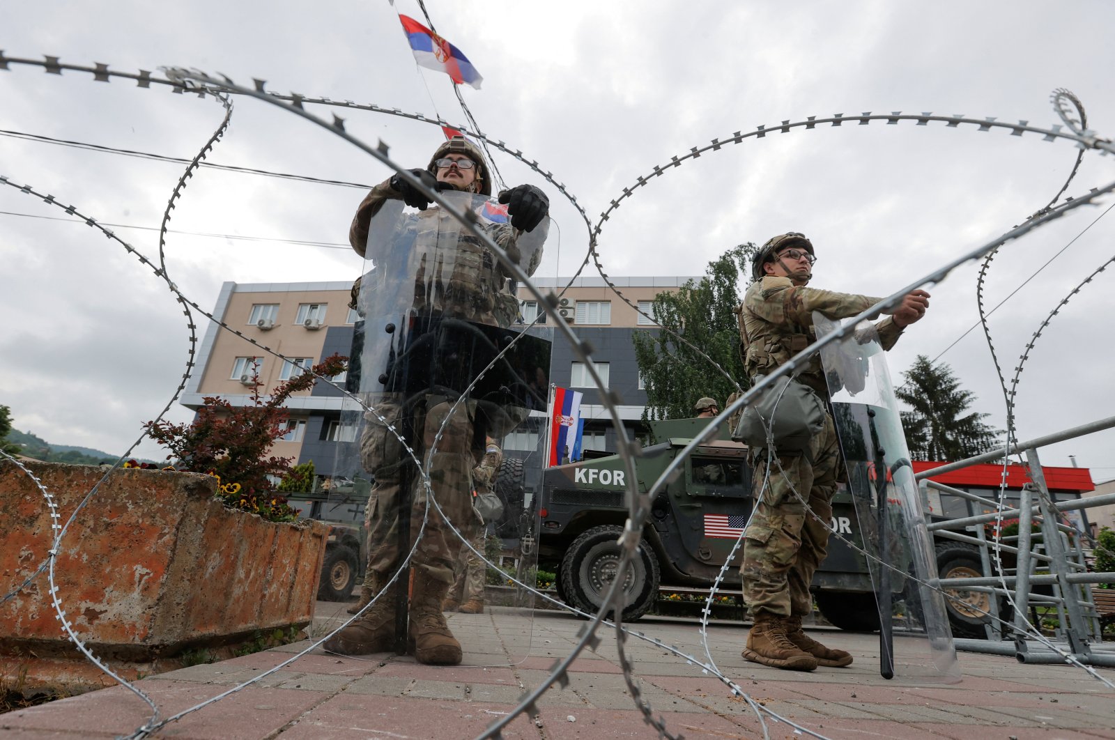 U.S. KFOR soldiers stand guard in front of the municipality office, Leposavic, Kosovo, May 29, 2023. (Reuters Photo)