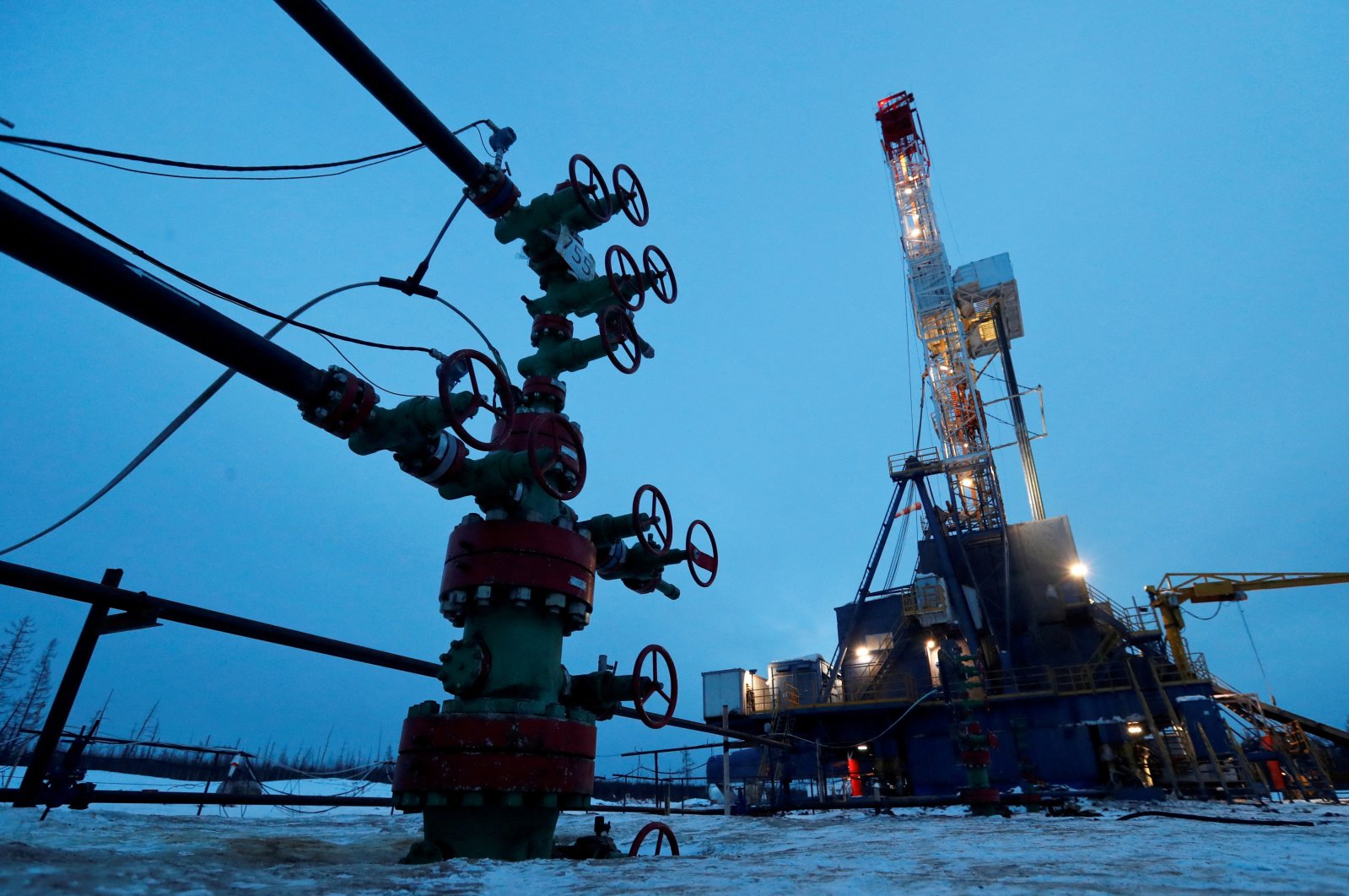 A wellhead and drilling rig in the Yarakta oilfield, owned by Irkutsk Oil Company (INK), Irkutsk region, Russia, March 11, 2019. (Reuters Photo)