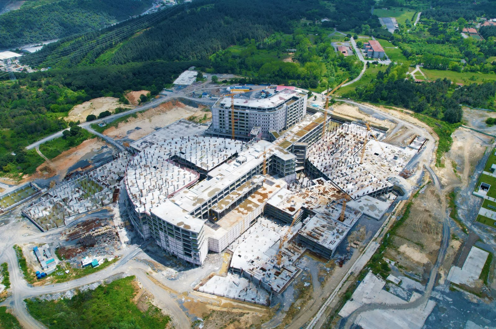 An aerial view of the building complex where the construction of a new campus of Istanbul University&#039;s Medical Faculty is underway, Istanbul, Türkiye, May 30, 2023. (IHA Photo)