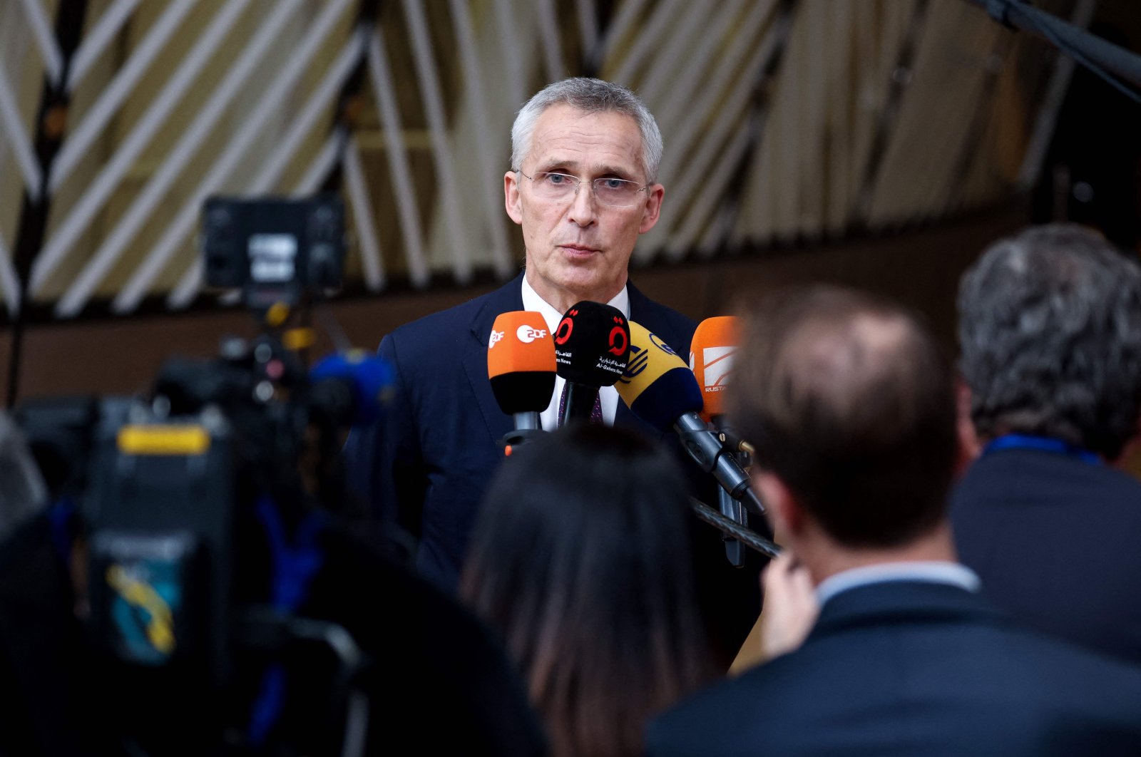 NATO Secretary-General Jens Stoltenberg speaks to journalists as he arrives for a Foreign Affairs Council at the EU headquarters in Brussels, May 23, 2023. (AFP Photo)