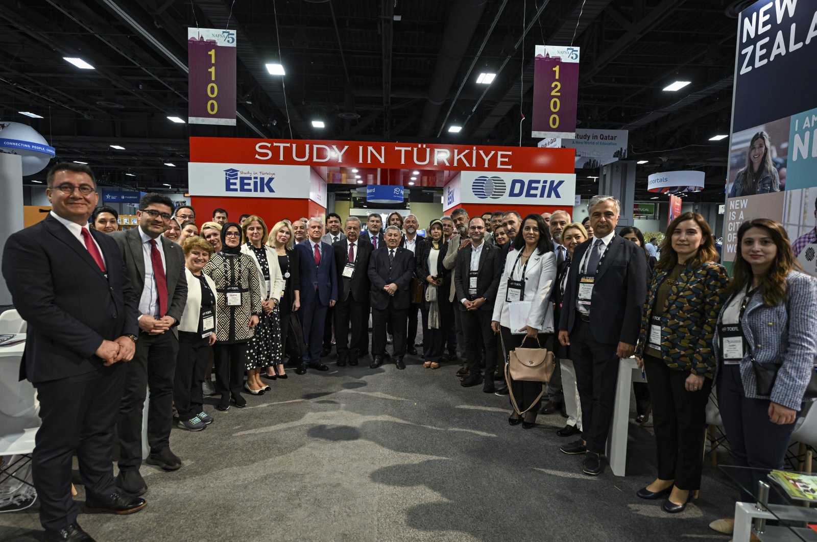 Representatives from Turkish universities are posing next to the stand during an international education expo in Washington DC, U.S., May 30, 2023. (AA Photo)
