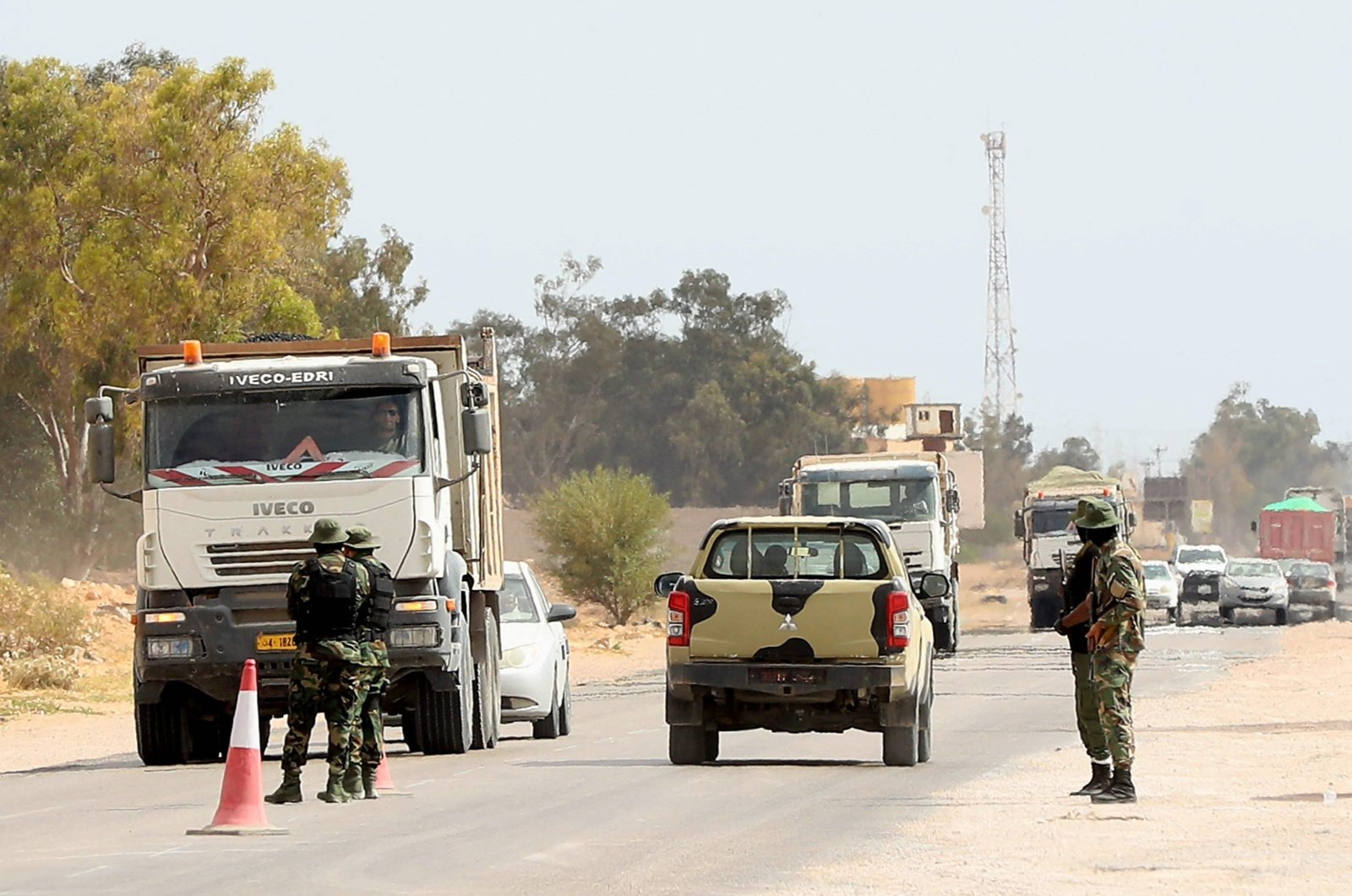 Libyan security forces man a checkpoint in the surrounding area in the northwestern city of Misrata, May 29, 2023. (AFP Photo)