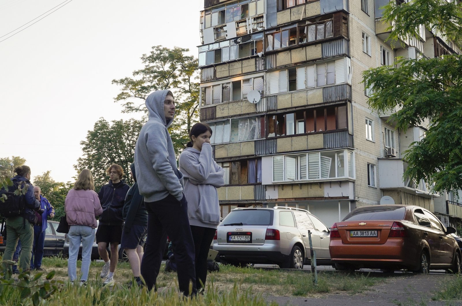 Locals react as they stand near a health center damaged in a missile strike in Kyiv, Ukraine, June 1, 2023. (EPA Photo)