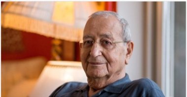 Mehmet Barlas poses for a photo at his home after an interview, in Istanbul, Türkiye. (Sabah Photo)