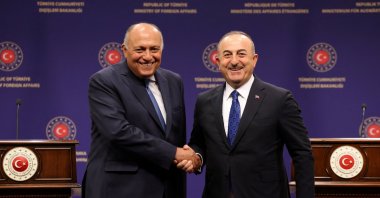 Foreign Minister Mevlüt Çavuşoğlu (R) and Egyptian counterpart Sameh Shoukry shake hands following a joint news conference in the capital Ankara, Türkiye, April 13, 2023. (AA Photo)