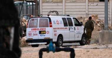 An ambulance is pictured near the Israeli Mount Harif military base near the city of Mitzpe Ramon in Israel's southern Negev desert, adjacent to the border with Egypt, on June 3, 2023. (AFP Photo)