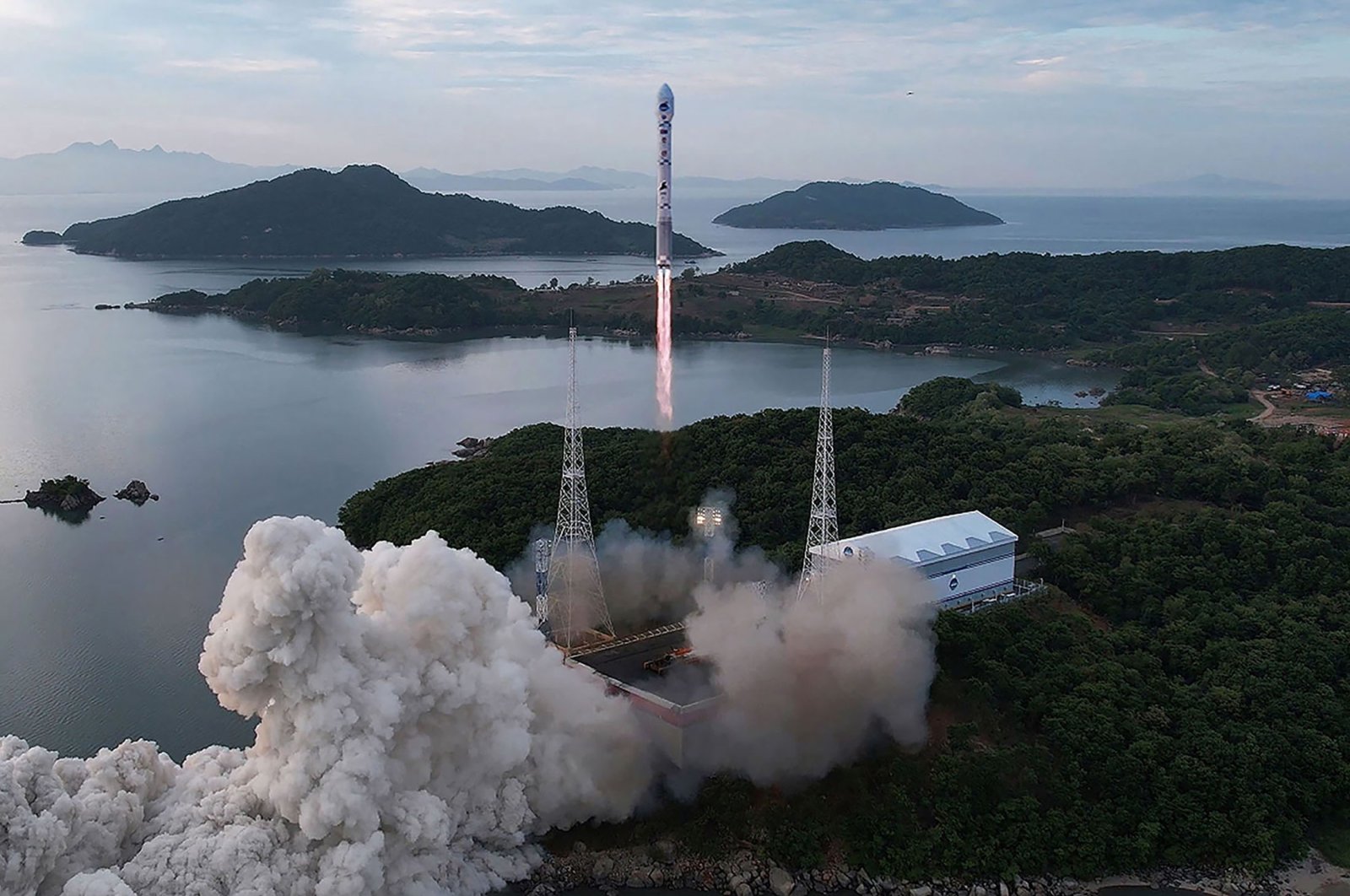 A new satellite-carrying rocket leaves the launch pad, at an undisclosed location in North Korea, May 31, 2023. (AFP Photo)