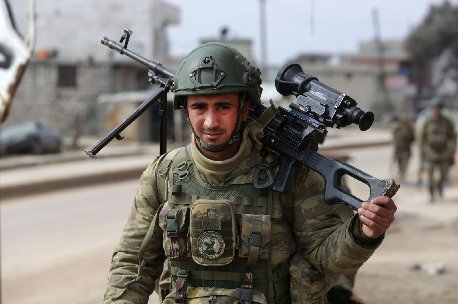 A Turkish soldier patrols with troops in the town of Atareb, western countryside of Aleppo province, Syria, Feb. 19, 2020. (AFP Photo)