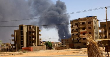 Smoke rises above buildings after an aerial bombardment in Khartoum, Sudan, May 1, 2023. (Reuters Photo)