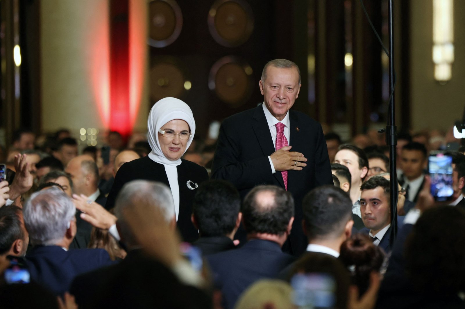 President Recep Tayyip Erdoğan (R) and first lady Emine Erdoğan greet guests during his oath-taking ceremony at the Presidential Complex, in Ankara, Türkiye, June 3, 2023. (Press Office of the Republic of Türkiye Photo via AFP)