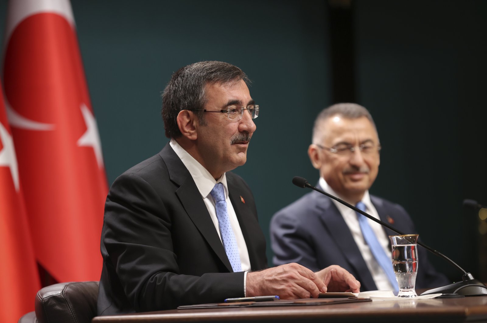 Cevdet Yılmaz (L) sits next to Fuat Oktay as he speaks at the handover ceremony, in the capital Ankara, Türkiye, June 5, 2023. (AA Photo) 