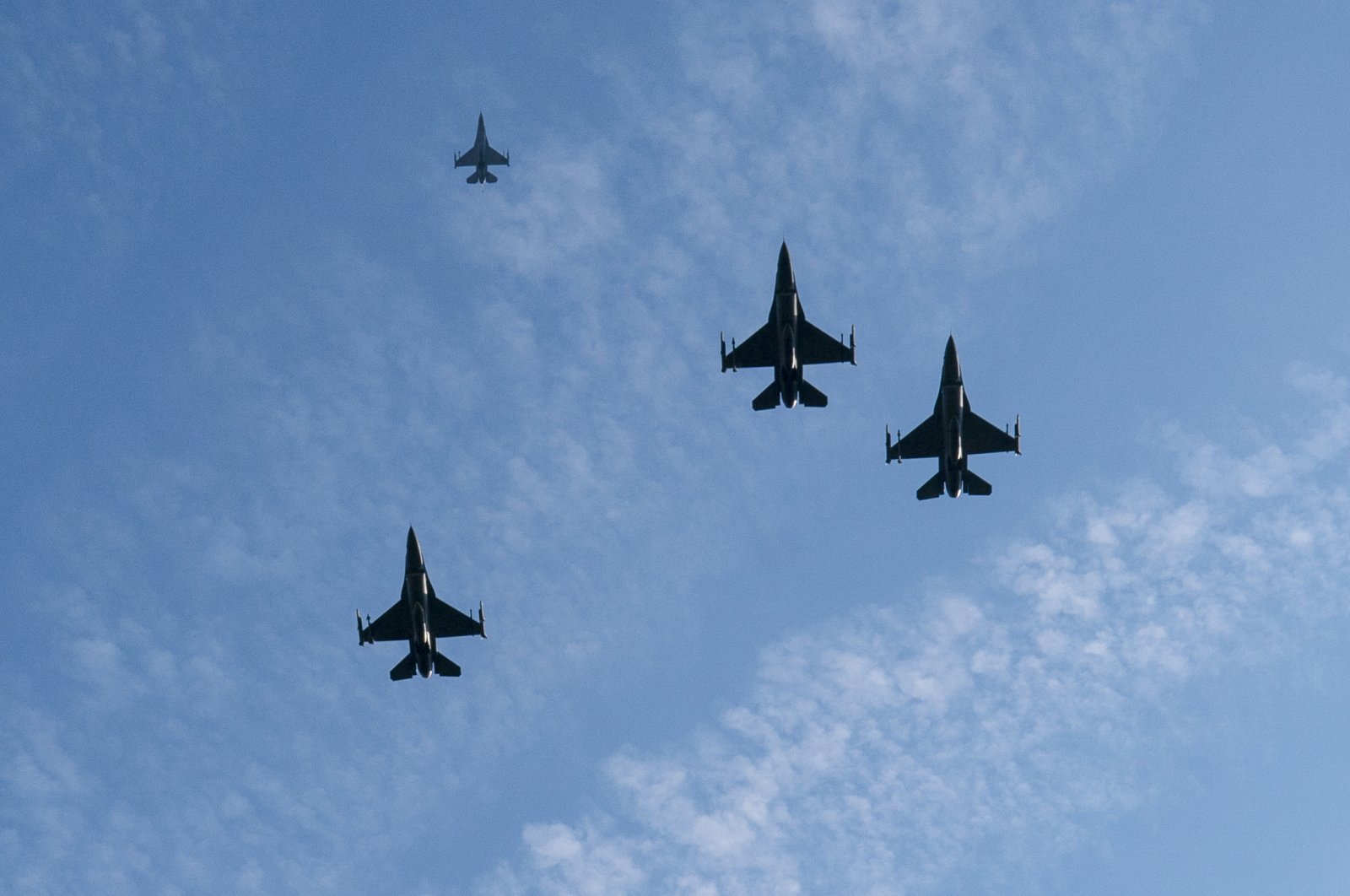 A formation of U.S. Air Force F-16 Fighting Falcons flies over during Arlington National Cemetery, Virginia, U.S., Nov. 11, 2021. (AP Photo)