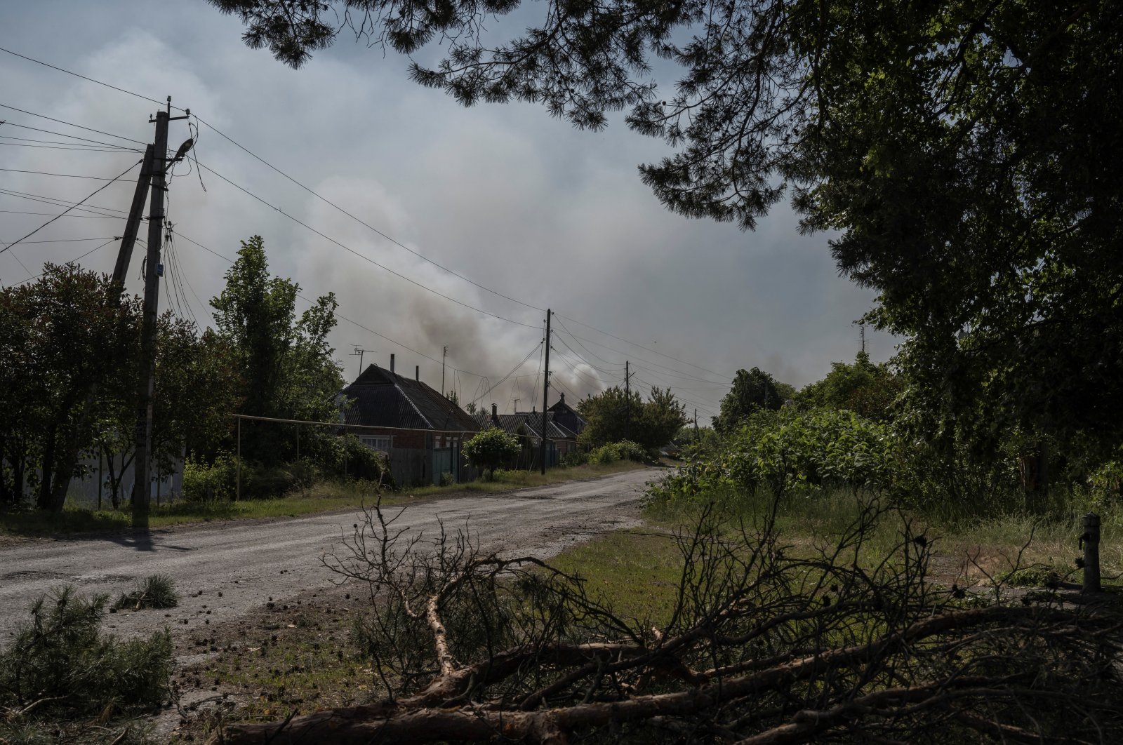 Smoke rising over an area of the Ukraine-Russia border is seen from the border town of Vovchansk, in Kharkiv region, Ukraine, June 4, 2023. (Reuters Photo)