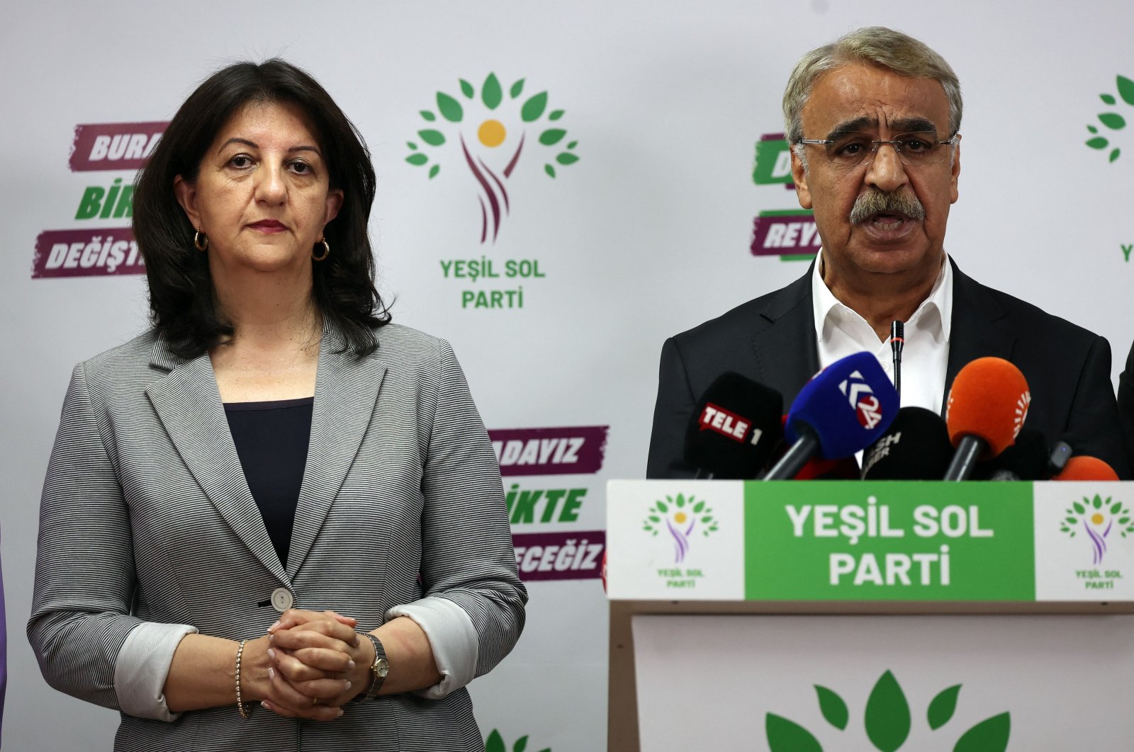Peoples&#039; Democracy Party (HDP) co-Chairs Pervin Buldan (L) and Mithat Sancar hold a news conference at the Green Left Party (YSP) headquarters in Ankara, Türkiye, May 25, 2023. (AFP Photo)