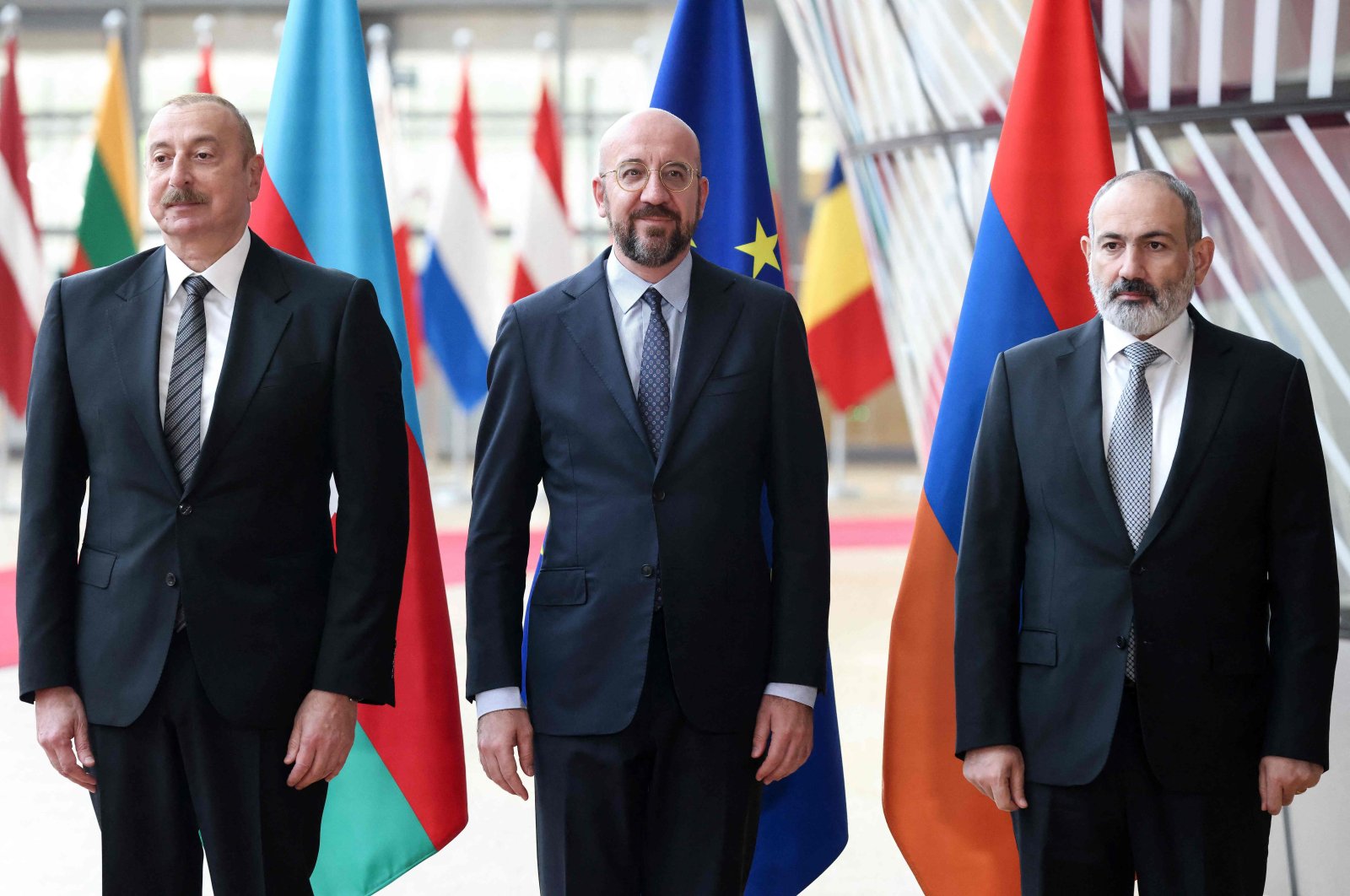 From left to right, Azerbaijani President Ilham Aliyev, European Council President Charles Michel and Armenian Prime Minister Nikol Pashinian pose for an official photograph before their meeting at the European Council in Brussels, Belgium, May 14, 2023. (AFP Photo)
