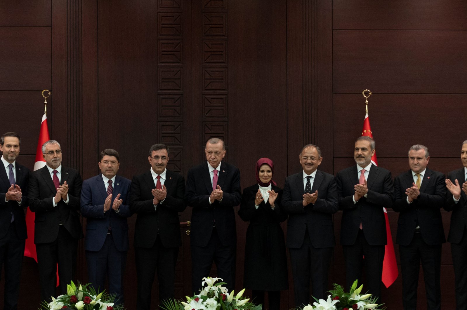 President Recep Tayyip Erdoğan (C) and new ministers applaud after a press conference where he announced the new Cabinet members at the Presidential Complex, Ankara, Türkiye, June 3, 2023. (Reuters Photo)