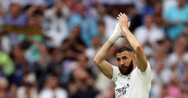 Real Madrid's French forward Karim Benzema applauds as he is substituted during the Spanish league football match between Real Madrid CF and Athletic Club Bilbao at the Santiago Bernabeu stadium, Madrid, Spain, June 4, 2023. (AFP Photo)