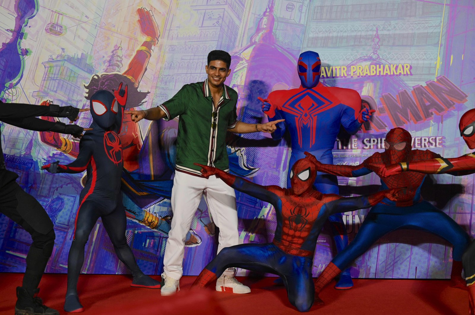 Indian Cricketer Shubman Gill poses for pictures during the trailer launch of the upcoming animated film &quot;Spider-Man: Across the Spider-Verse,&quot; for which he has done the voiceover in Hindi and Punjabi languages for the character of Spiderman, Mumbai, India, May 18, 2023. (AFP Photo)