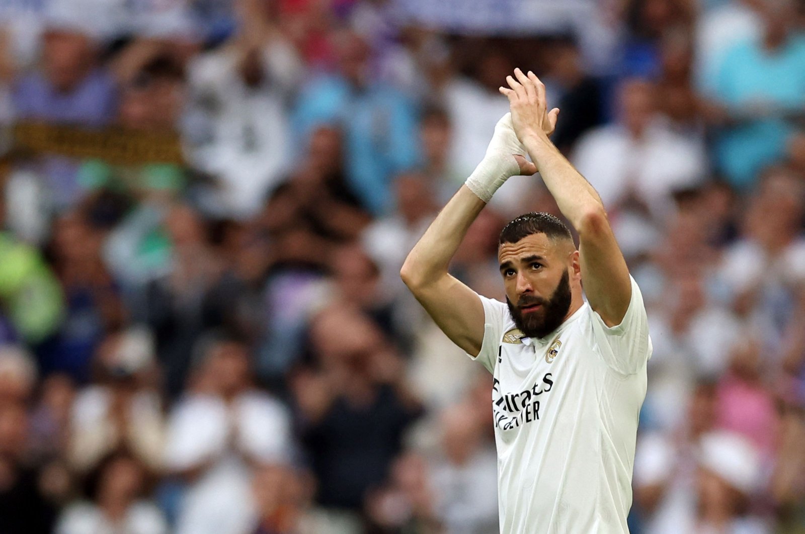 Real Madrid&#039;s French forward Karim Benzema applauds as he is substituted during the Spanish league football match between Real Madrid CF and Athletic Club Bilbao at the Santiago Bernabeu stadium, Madrid, Spain, June 4, 2023. (AFP Photo)