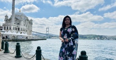 Sudhi Choudhary, Consul General of India poses in front of the iconic Ortaköy Mosque, or Grand Mecidiye Mosque, situated at the waterside of the Ortaköy pier square, Istanbul, Türkiye, June 5, 2023. (Photo by Daily Sabah)