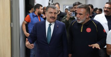 Health Minister Fahrettin Koca (L) during the visit to Defne State Hospital, Hatay, Türkiye, May 21, 2023. (AA Photo)