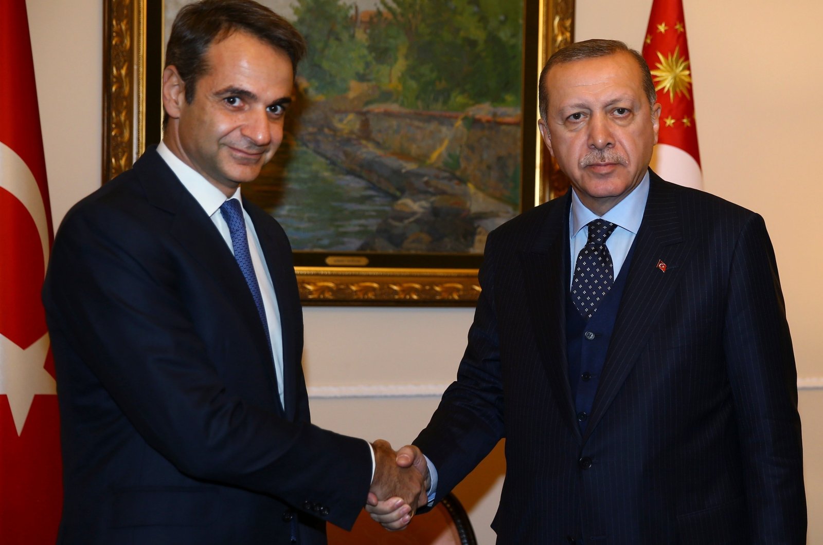 President Recep Tayyip Erdoğan (R), on a two-day official visit to Greece, meets Kyriakos Mitsotakis, then-leader of the main opposition New Democracy party, Athens, Greece, Dec. 7, 2017. (AP File Photo)