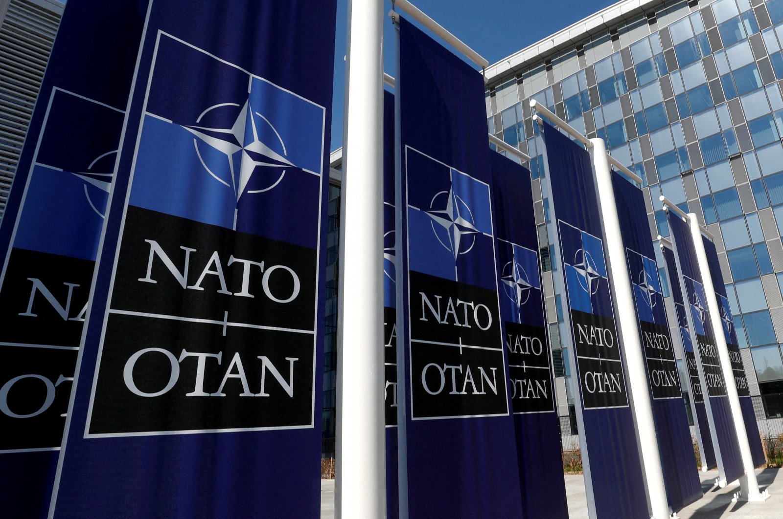 Banners displaying the NATO logo are placed at the entrance of the new NATO headquarters during the move to the new building, in Brussels, Belgium April 19, 2018. (Reuters File Photo)