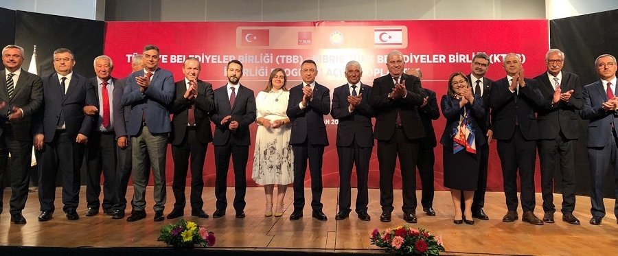 Turkish and Turkish Cypriot officials attend an event to promote cooperation between municipality unions in Güzelyurt, Turkish Republic of Northern Cyprus, June 24, 2022. (Courtesy of Union of Municipalities of Türkiye) 