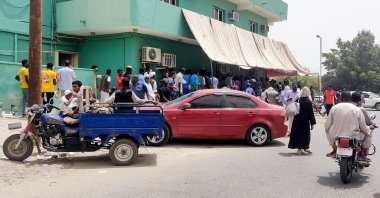 Residents go out to run errands as fighting eases off during a brief cease-fire in the ongoing conflict between the army and the paramilitary Rapid Support Forces (RSF) in Port Sudan, Sudan, May 28, 2023. (AA Photo)