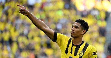 Dortmund's English midfielder Jude Bellingham celebrates after scoring the 2-0 goal during the German first division Bundesliga football match between BVB Borussia Dortmund and Borussia Moenchengladbach, Dortmund, Germany, May 13, 2023. (AFP Photo)