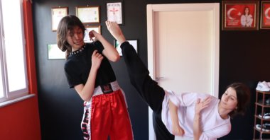 Turkish young kickboxer Havvanur Velioğlu (R) trains at the Kömürkent Sports Club, Zonguldak, Türkiye, June 6, 2023. (AA Photo)