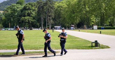 French police gather at the scene of a knife attack in Annecy, France, June 8, 2023. (EPA Photo)