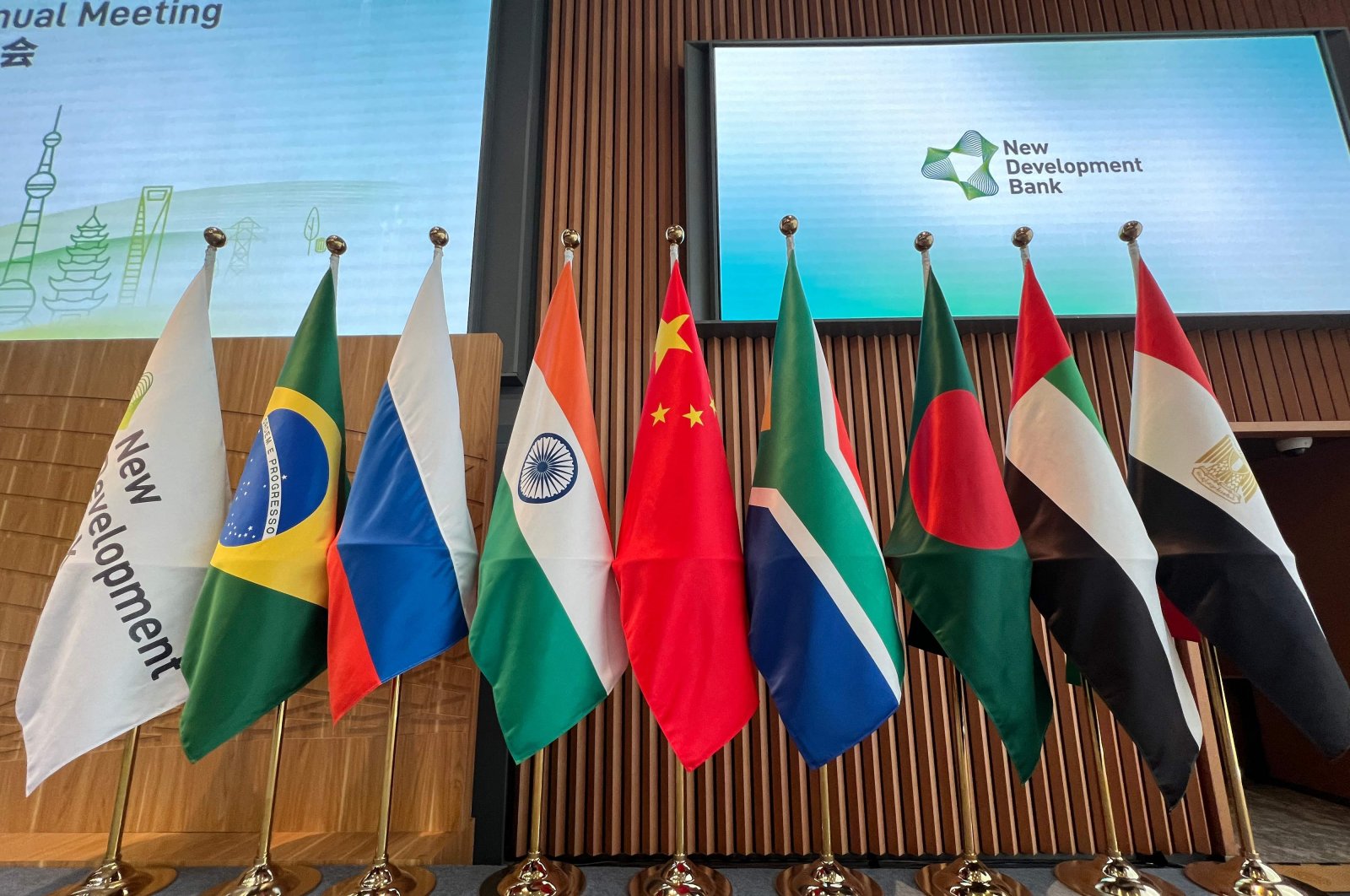 Flags are seen displayed at the opening ceremony of the New Development Bank (NDB) 8th Annual Meeting in Shanghai, China, May 30, 2023. (AFP Photo)