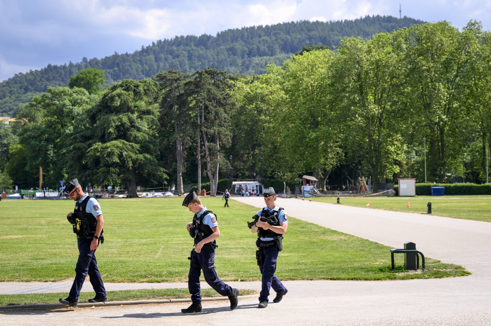French police gather at the scene of a knife attack in Annecy, France, June 8, 2023. (EPA Photo)