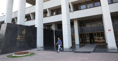 A man walks in front of the headquarters of the Central Bank of the Republic of Türkiye, in Ankara, Türkiye, June 9, 2023. (AFP Photo)