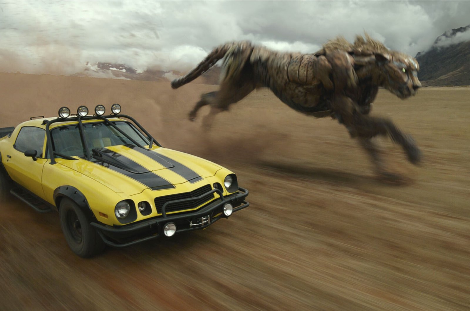 Bumblebee (L) and Cheetor, in a scene from the film &quot;Transformers: Rise of the Beasts.&quot; (AP Photo)