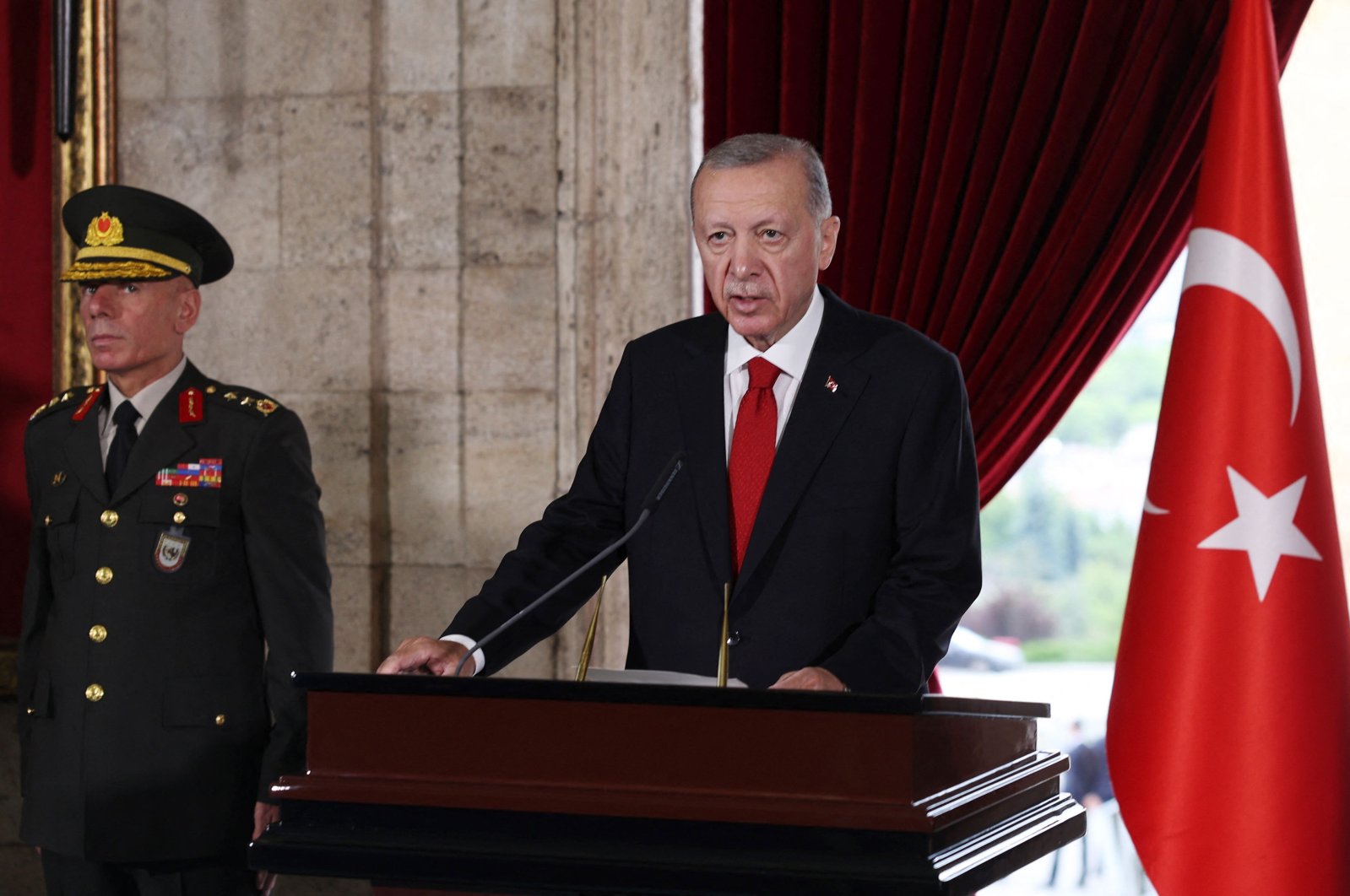 President Recep Tayyip Erdoğan delivers a speech after a visit with members of his new cabinet to Anıtkabir, the mausoleum of the founder of the Republic of Türkiye, Mustafa Kemal Atatürk, before their first cabinet meeting in Ankara, June 6, 2023. (AFP Photo)