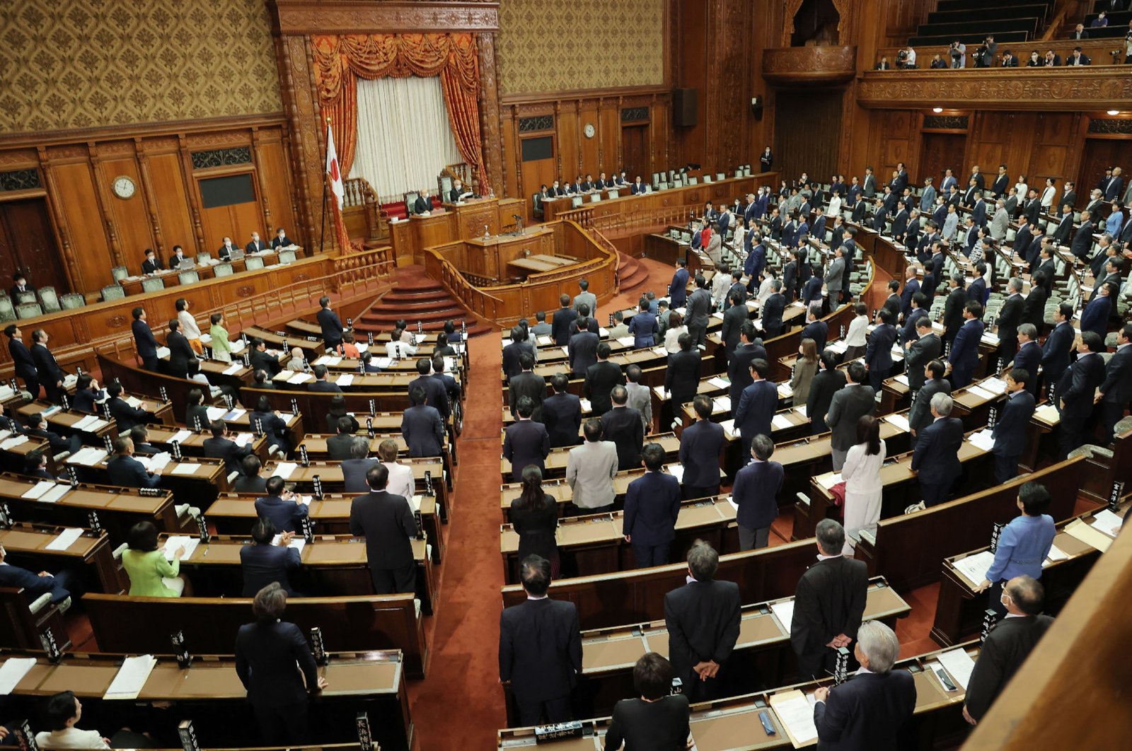 Members of the chamber vote to pass the revised Immigration Control and Refugee Recognition Act, which reviews the detention and deportation rules of foreigners, during a plenary session of the House of Councillors at the parliament building, Tokyo, Japan, June 9, 2023. (AFP Photo)