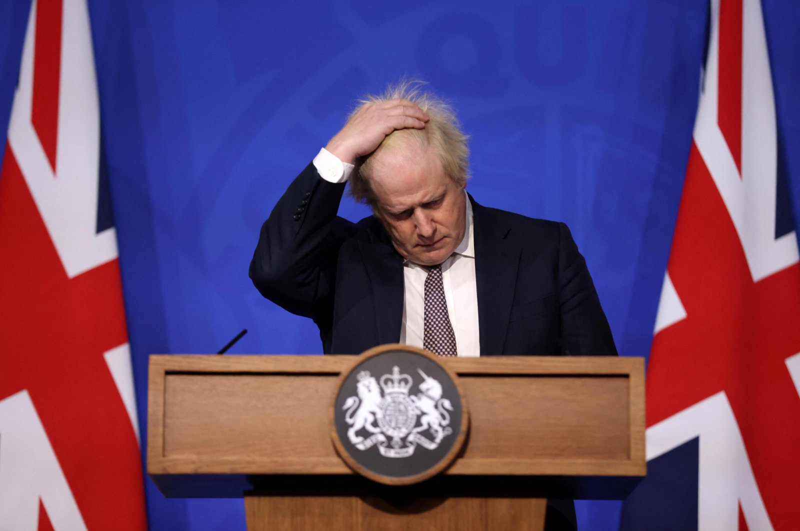  Britain&#039;s then-Prime Minister Boris Johnson gestures as he attends a media briefing on the latest COVID-19 update in the Downing Street briefing room in central London, Nov. 27, 2021. (AFP File Photo)