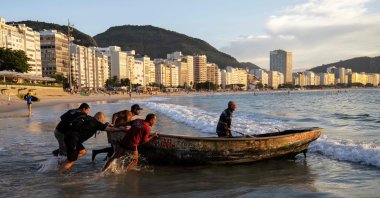 Fishermen prepare to set sail at the shore of Copacabana Beach in Rio de Janeiro, Brazil, May 23, 2023. (AFP Photo)