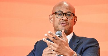 Jeremy Awori, Group CEO of Ecobank, takes part in a panel discussion at the 2023 Africa CEO Forum in Abidjan on June 5, 2023. (AFP Photo)