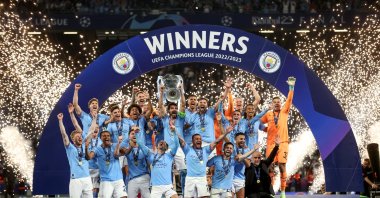 Manchester City's German midfielder Ilkay Gündoğan holds aloft the European Cup trophy as they celebrate winning the UEFA Champions League final football match between Inter Milan and Manchester City at the Ataturk Olympic Stadium in Istanbul, Türkiye, June 10, 2023. (AFP Photo)